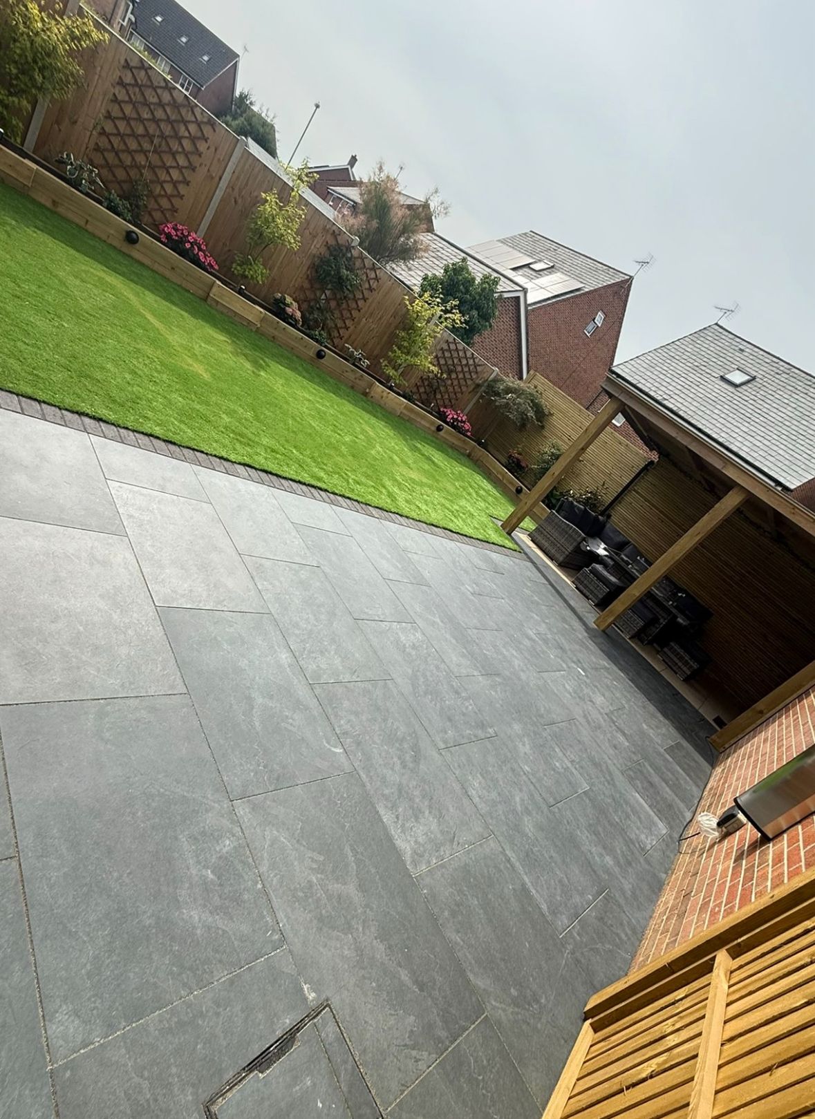 Large format paving with artificial grass